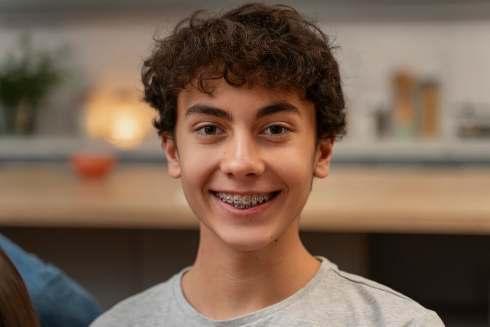 A person with braces choosing healthy food options like fruits and vegetables to support orthodontic treatment.